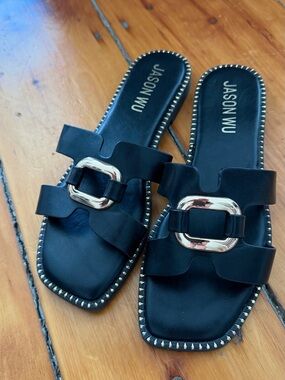 Jason Wu Black Slide Mules with Gold Buckle Accent